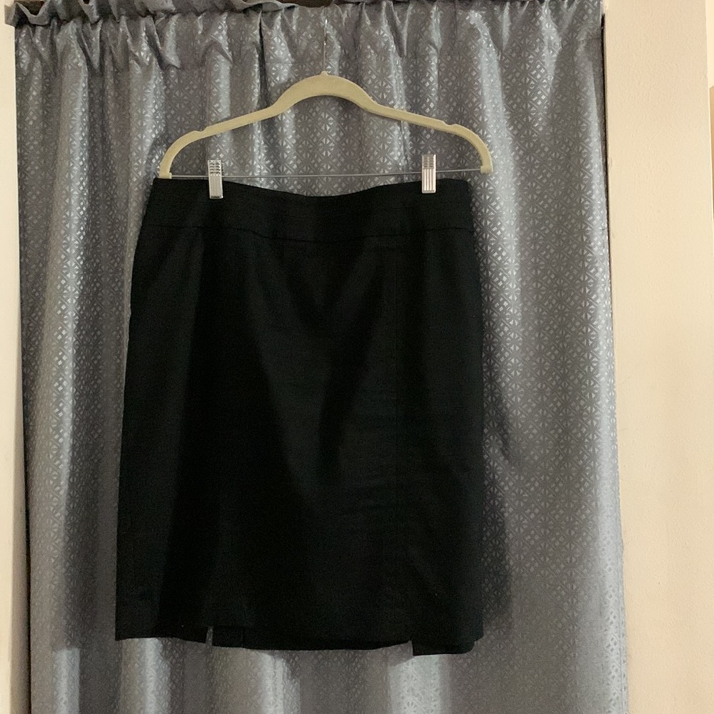 3 skirts for $12 two are black and 1 is gray. knee length great for career use